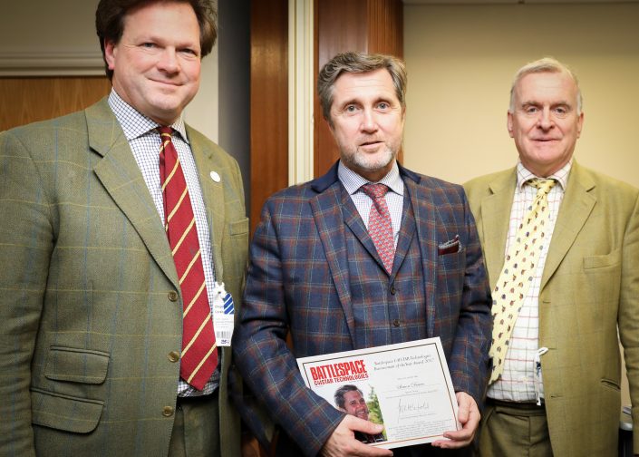 Simon is presented with the Battlespace Businessman of the Year Award