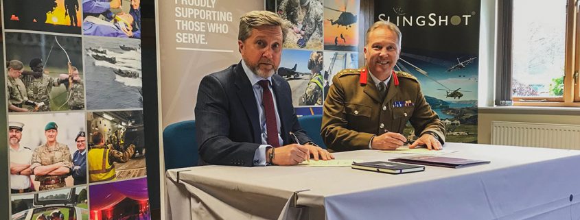 Simon Davies, CEO of Spectra Group, signing the Armed Forces Recognition Covenant