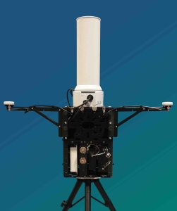 TOTM terminal showing the compact, ruggedised troposcatter system with vertically mounted advanced auto-tracking antenna. Designed for fast deployment hi-bandwidth data networks in mobile environments.