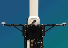 TOTM terminal showing the compact, ruggedised troposcatter system with vertically mounted advanced auto-tracking antenna. Designed for fast deployment hi-bandwidth data networks in mobile environments.