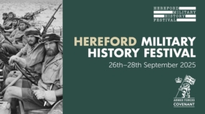 Promotional banner for the Hereford Military History Festival, taking place 26th–28th September 2025. The left side features a historic black-and-white photo of Special Forces soldiers seated in a military vehicle in desert conditions. The right side displays the festival name, dates, and logos for the Hereford Military History Festival and the Armed Forces Covenant.