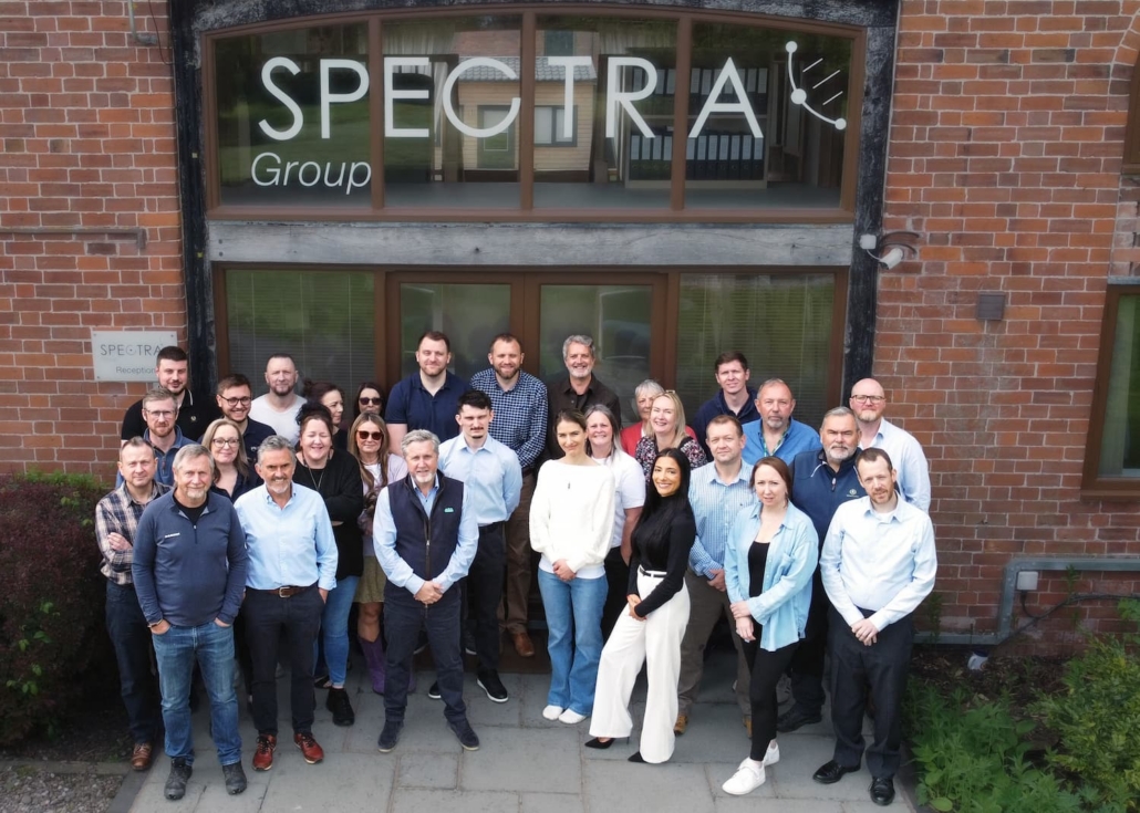 Spectra Group staff gathered outside their Herefordshire headquarters, celebrating the company's King's Award for Enterprise 2026 in International Trade